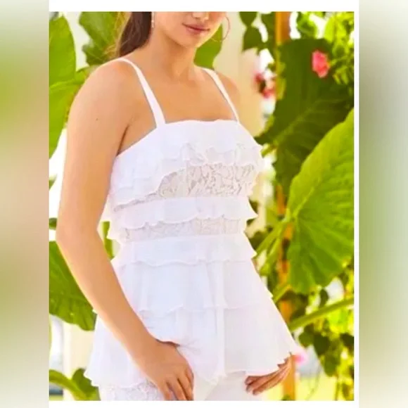 Lilly Pulitzer white chiffon top,with ruffles and detailing. Zips in back  size 4
